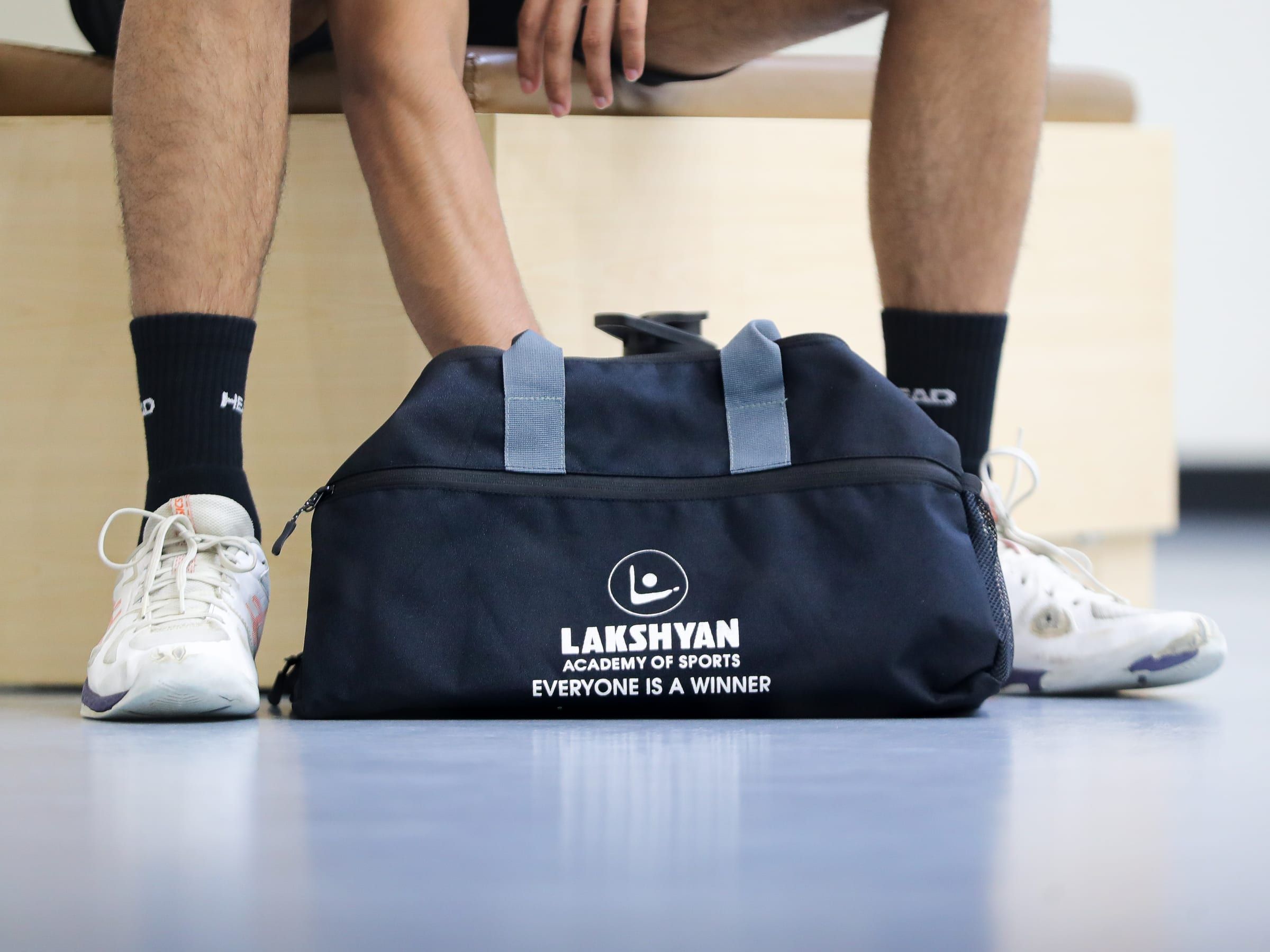 A Lakshyan kit bag carrying the “Everyone is a winner” tagline